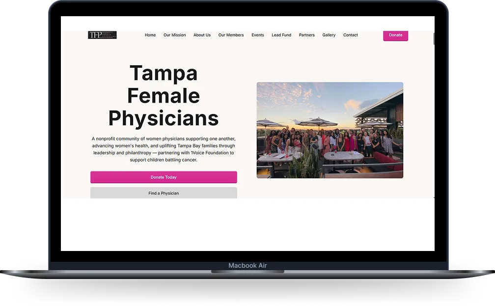 Tampa Female Physicians homepage on a laptop